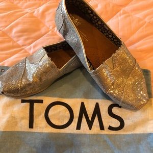 Tom’s  Silver Glitter Slip Ons